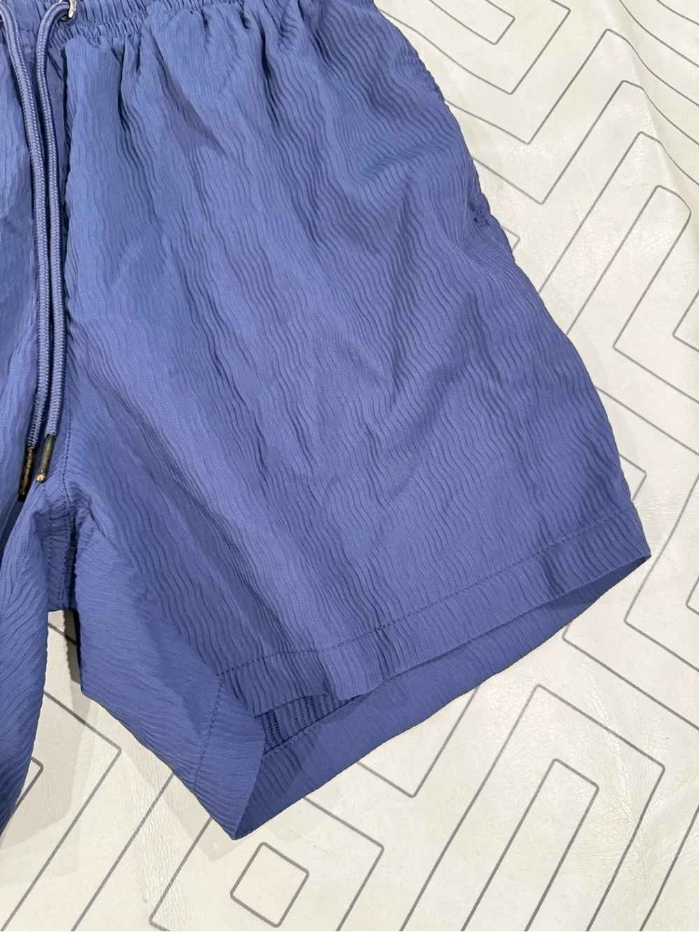 Chubbies Blue Textured Swim Trunks